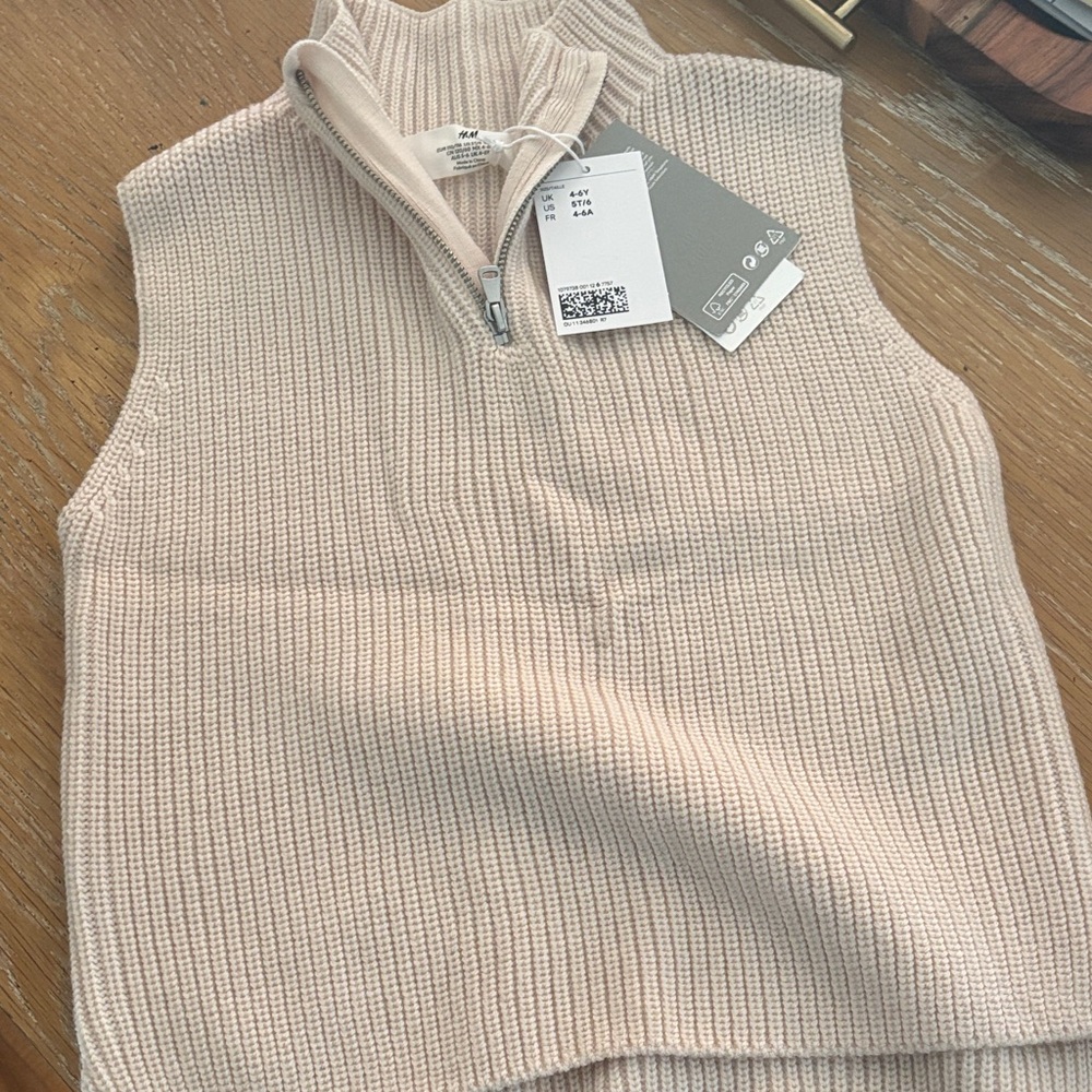 Girls Cream Sleeveless Turtleneck Sweater with front zipper